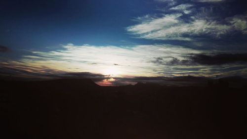 Silhouette of trees against sky