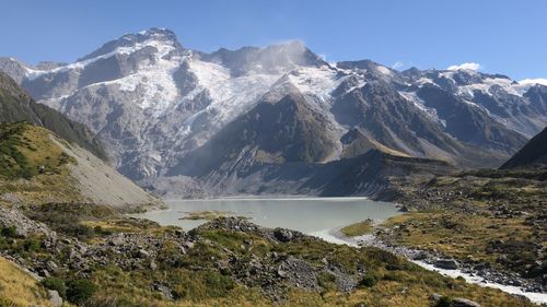 Scenic view of snowcapped mountains against sky