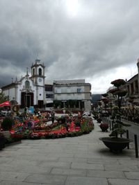 Buildings in city against sky