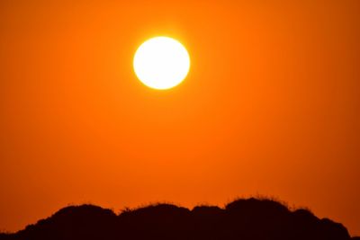 Scenic view of sunset against sky