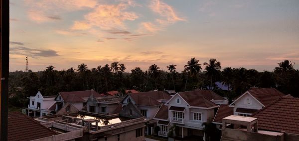 High angle view of townscape against sky at sunset