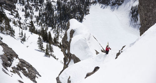 High angle view of people on snowcapped mountain