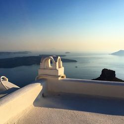 Scenic view of sea in front of fort against clear sky on sunny day