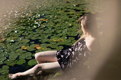 Midsection of woman in water