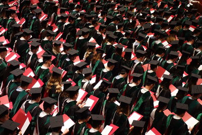 High angle view of people in graduation gown