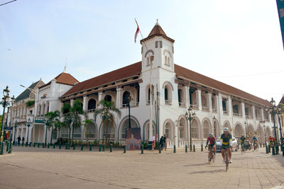 Group of people in front of building