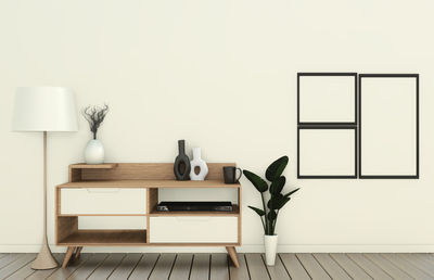 Chairs on table against wall at home
