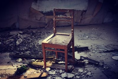 Abandoned chair on floor