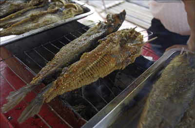 High angle view of meat on barbecue grill