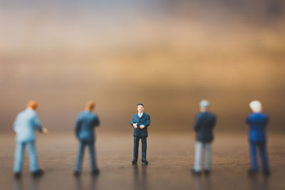 Figurines on wooden table