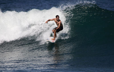 Man surfing in sea