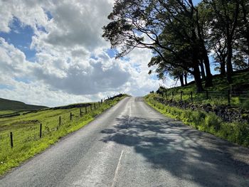 Kidstones bank, road, leading over the hills at cray, with cloudy skies in, buckden, skipton, uk