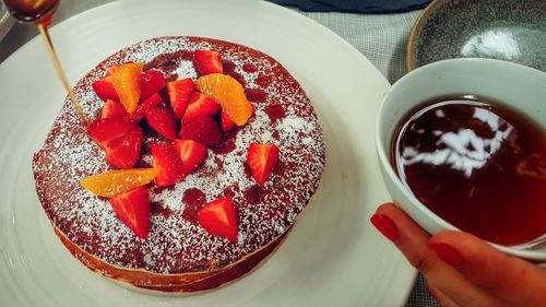 Cropped image of women having pancake