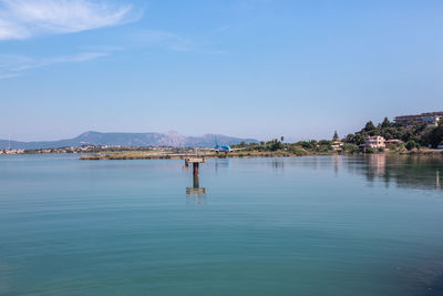 Scenic view of sea against blue sky