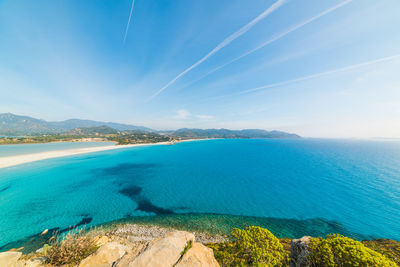 Scenic view of sea against blue sky