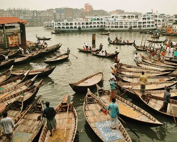 Boats moored at dock