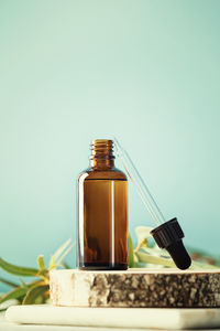 Close-up of drink in jar against white background