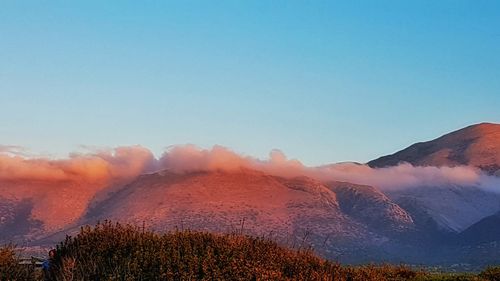 Scenic view of mountains against clear sky