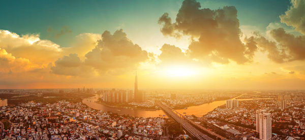 High angle view of city during sunset