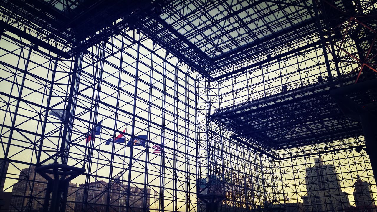 low angle view, indoors, architecture, built structure, ceiling, architectural feature, pattern, interior, skylight, glass - material, window, design, building, history, famous place, day, no people, travel destinations, silhouette, architectural column