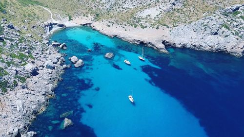 High angle view of rocks in sea