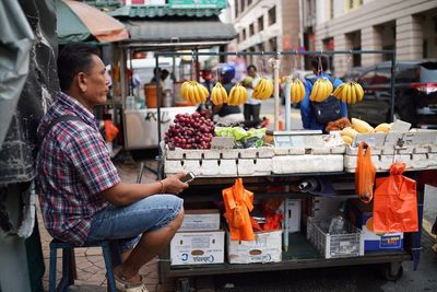 Man working at market stall