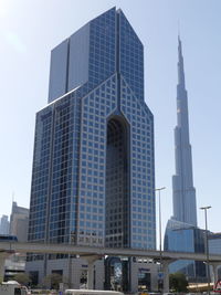 Low angle view of modern buildings against sky