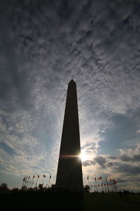 Silhouette built structure against sky