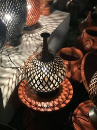 High angle view of illuminated lighting equipment on table