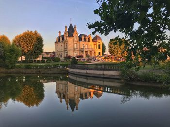 Reflection of buildings in lake