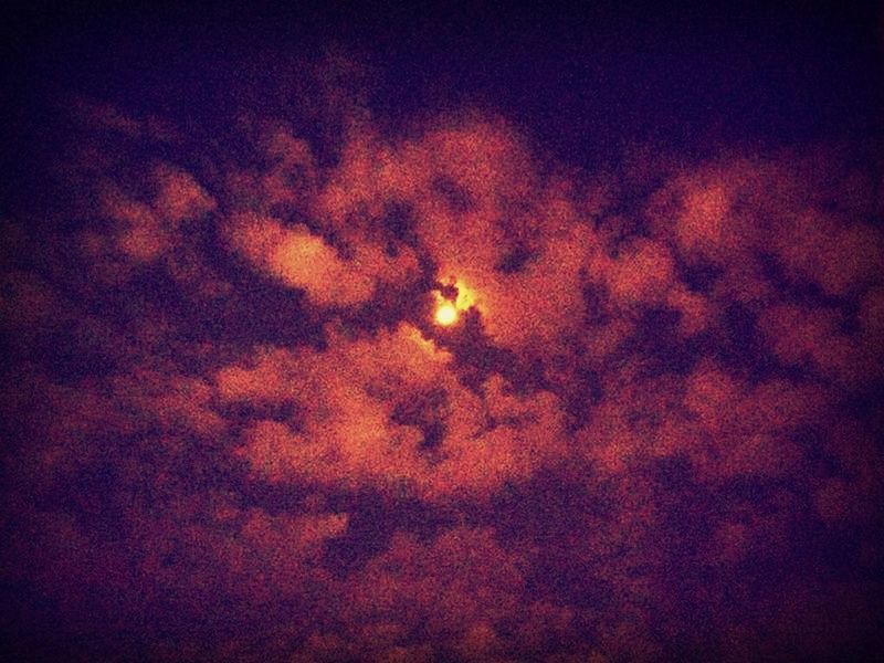 LOW ANGLE VIEW OF MOON IN SKY