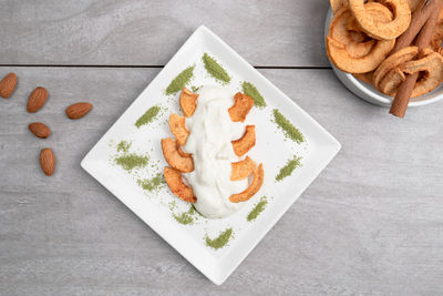 High angle view of food served on table