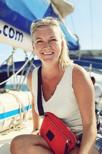 Portrait of a smiling young woman in boat