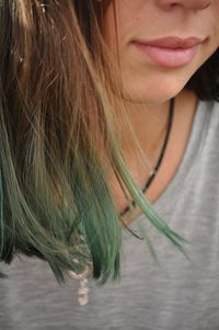 Young woman with eyes closed