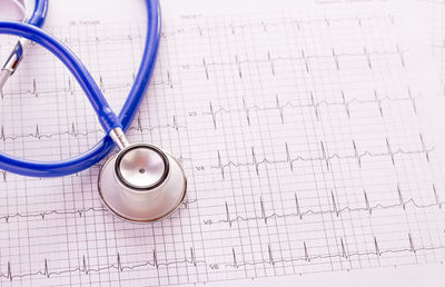 High angle view of pen on paper