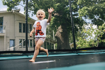Girl on trampoline  barefoot