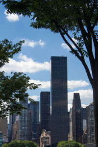 Low angle view of skyscrapers against sky