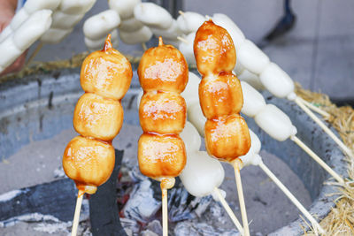 High angle view of orange on barbecue grill