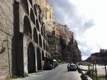 View of road along buildings