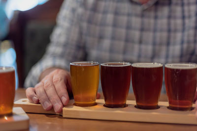 Close-up of beer glass on table