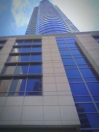 Low angle view of modern building against sky
