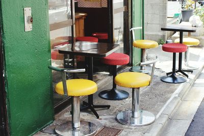 Close-up of multi colored glass on table at restaurant