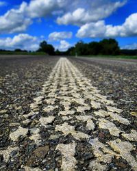 Surface level of road against sky
