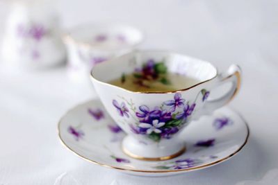 Close-up of purple tea served on table