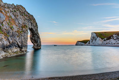 Durdle door at the jurassic coast in devon after sunset