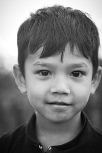 Close-up portrait of smiling boy