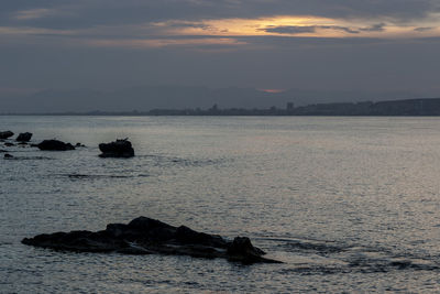 Scenic view of sea against sky during sunset