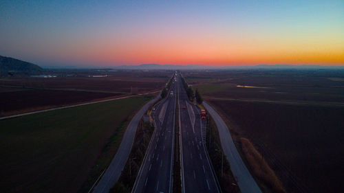 High angle view of a highway road at the sunset