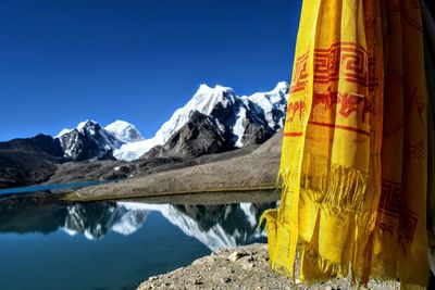 Scenic view of mountains against cloudy sky