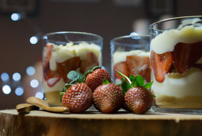 Close-up of fresh fruits in glass on table